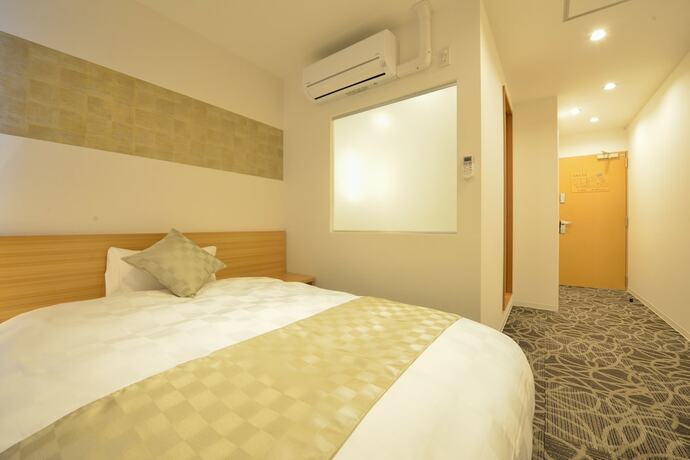 Imagen de la habitación del Hotel Sakura Garden. Foto 12