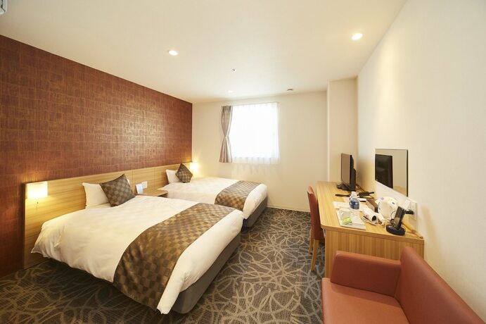 Imagen de la habitación del Hotel Sakura Garden. Foto 17