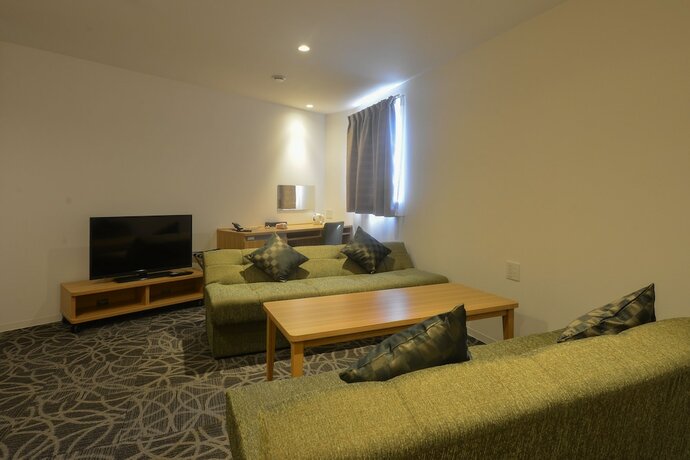 Imagen de la habitación del Hotel Sakura Garden. Foto 18