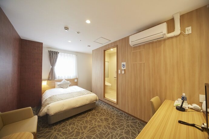 Imagen de la habitación del Hotel Sakura Garden. Foto 19