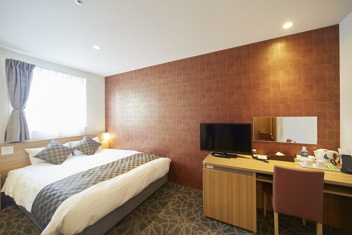 Imagen de la habitación del Hotel Sakura Garden. Foto 22