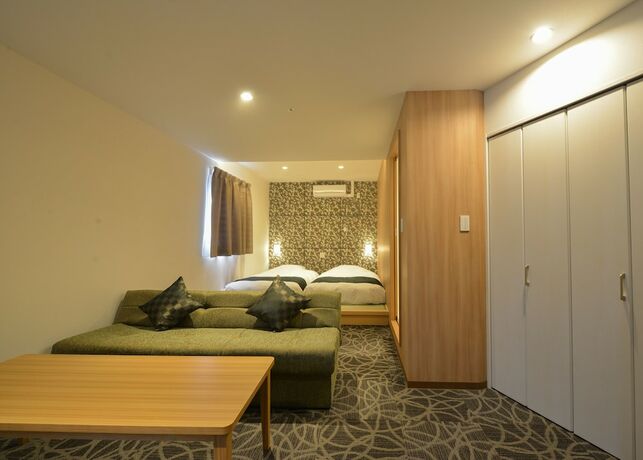 Imagen de la habitación del Hotel Sakura Garden. Foto 25