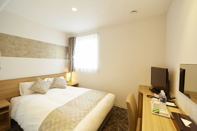 Imagen de la habitación del Hotel Sakura Garden. Foto 30