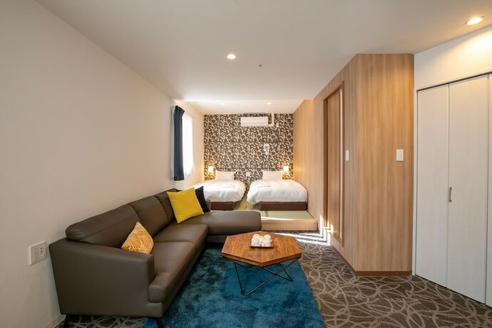 Imagen de la habitación del Hotel Sakura Garden. Foto 31