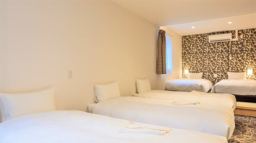 Imagen de la habitación del Hotel Sakura Garden. Foto 32