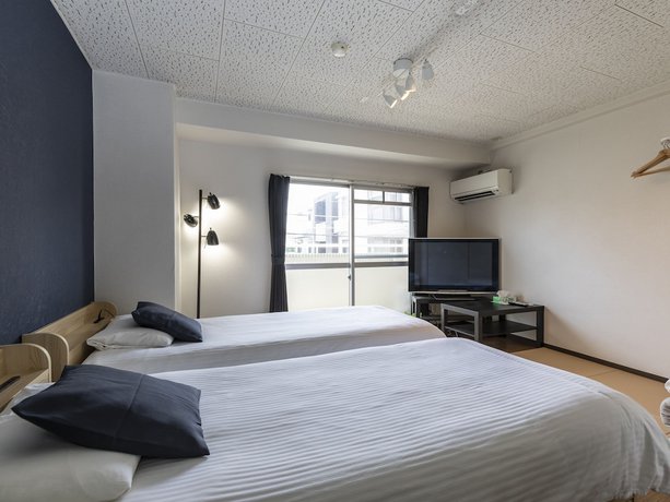Imagen de la habitación del Hotel Sakura Guest House, Kyoto Ciudad. Foto 8