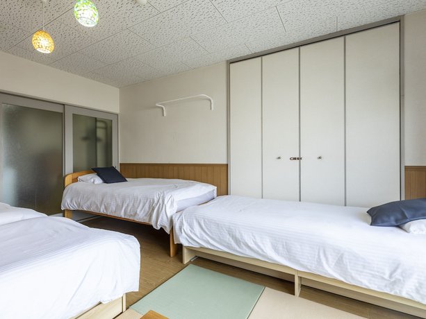 Imagen de la habitación del Hotel Sakura Guest House, Kyoto Ciudad. Foto 11