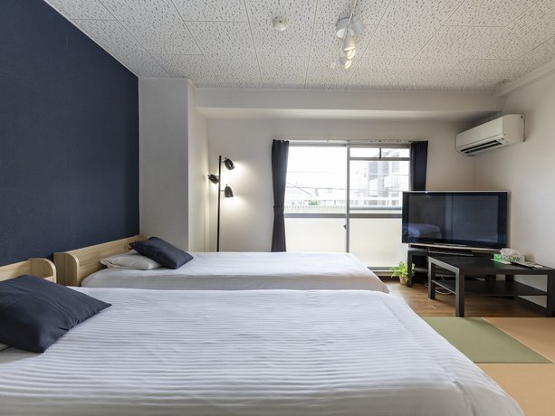 Imagen de la habitación del Hotel Sakura Guest House, Kyoto Ciudad. Foto 15