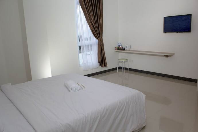 Imagen de la habitación del Hotel Sakura Manado. Foto 23