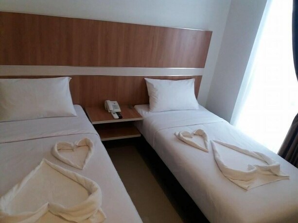 Imagen de la habitación del Hotel Sakura Manado. Foto 24