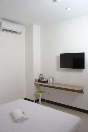 Imagen de la habitación del Hotel Sakura Manado. Foto 25