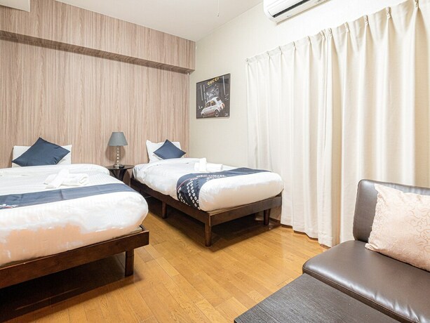 Imagen de la habitación del Hotel Sakura Sands Hotel. Foto 4