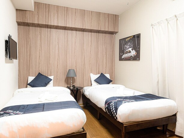 Imagen de la habitación del Hotel Sakura Sands Hotel. Foto 6
