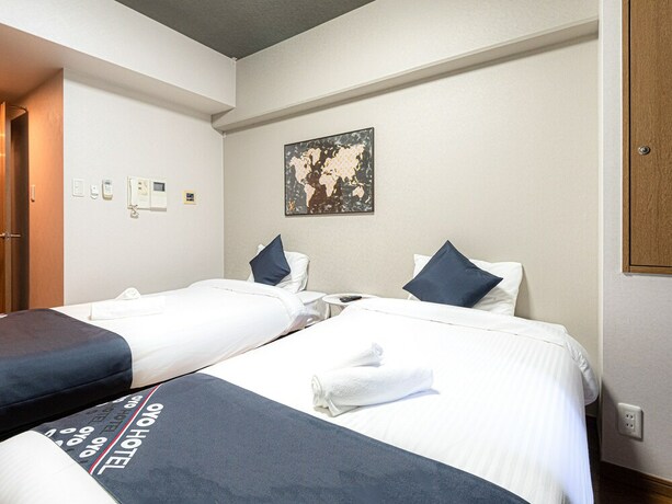 Imagen de la habitación del Hotel Sakura Sands Hotel. Foto 7