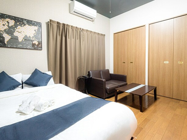 Imagen de la habitación del Hotel Sakura Sands Hotel. Foto 9