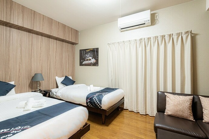 Imagen de la habitación del Hotel Sakura Sands Hotel. Foto 10