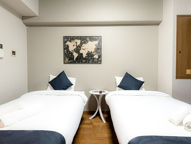 Imagen de la habitación del Hotel Sakura Sands Hotel. Foto 13