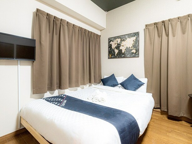 Imagen de la habitación del Hotel Sakura Sands Hotel. Foto 14