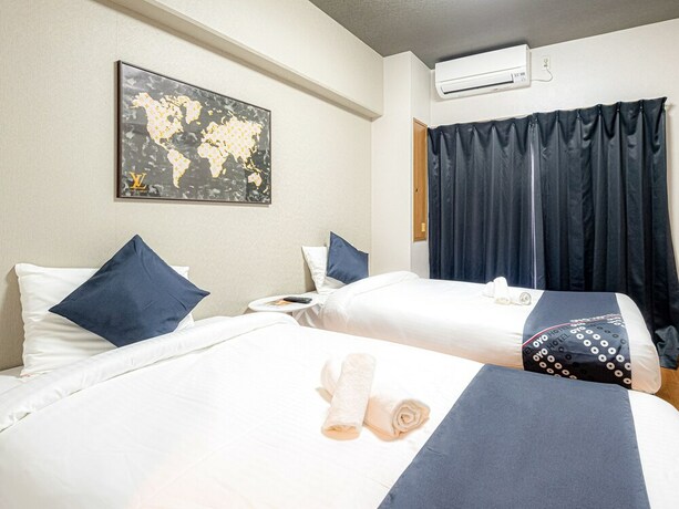 Imagen de la habitación del Hotel Sakura Sands Hotel. Foto 15