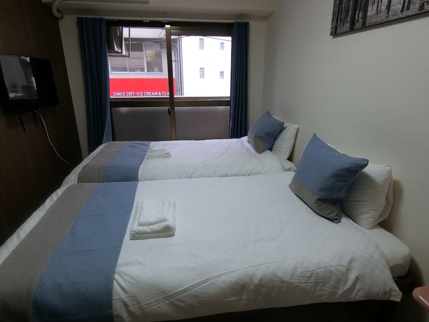 Imagen de la habitación del Hotel Sakura Sands Shinsaibashi. Foto 8