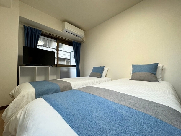 Imagen de la habitación del Hotel Sakura Sands Shinsaibashi. Foto 10