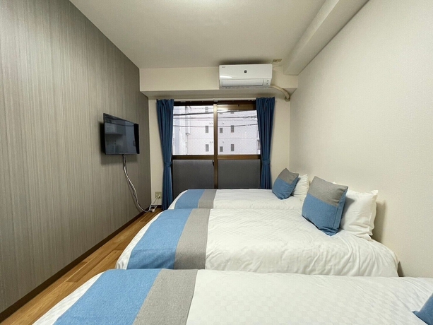 Imagen de la habitación del Hotel Sakura Sands Shinsaibashi. Foto 11