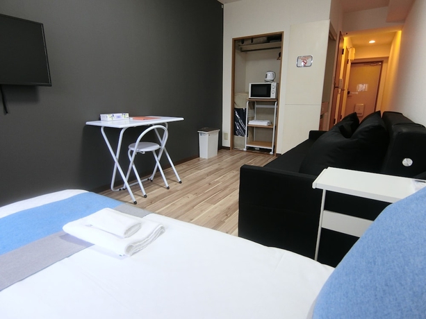Imagen de la habitación del Hotel Sakura Sands Shinsaibashi. Foto 14