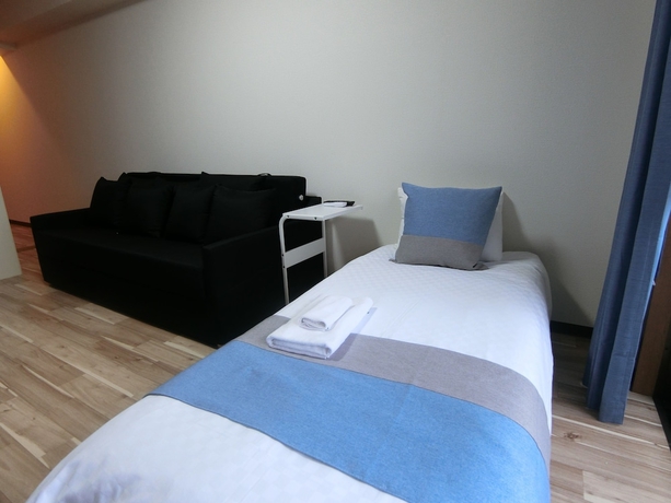 Imagen de la habitación del Hotel Sakura Sands Shinsaibashi. Foto 19