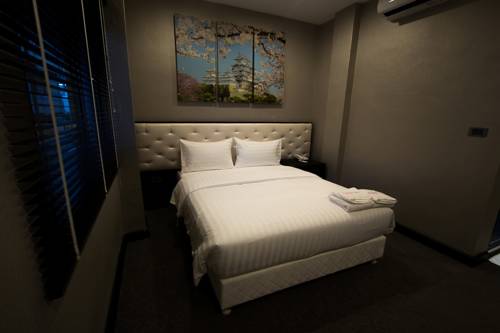 Imagen de la habitación del Hotel Sakura Sky Residence. Foto 10