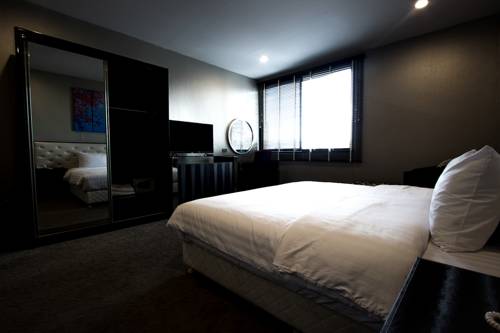 Imagen de la habitación del Hotel Sakura Sky Residence. Foto 14