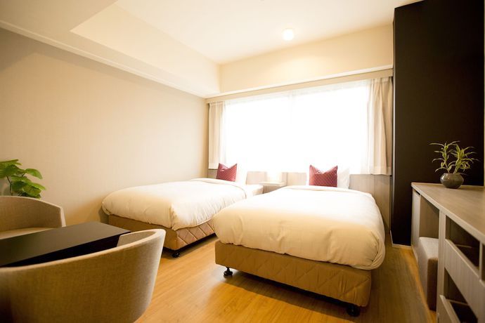 Imagen de la habitación del Hotel Sakura Terrace. Foto 11