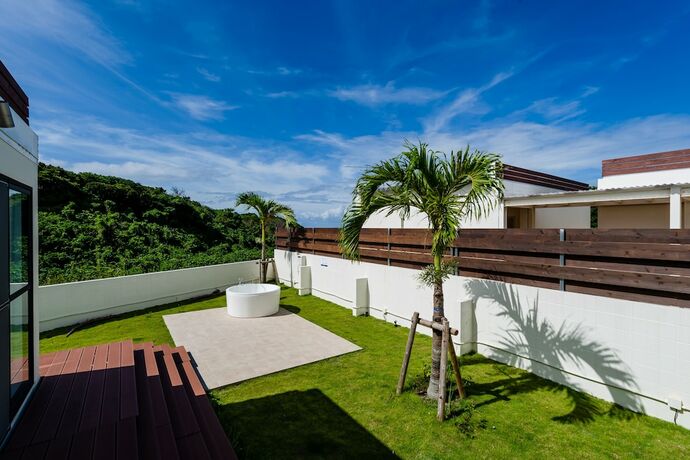 Imagen de la habitación del Hotel Sakura Terrace Nakijin. Foto 11