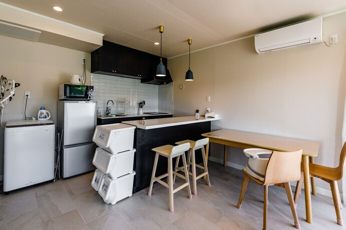 Imagen de la habitación del Hotel Sakura Terrace Nakijin. Foto 16