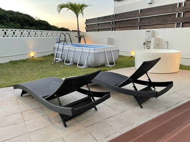 Imagen de la habitación del Hotel Sakura Terrace Nakijin. Foto 19