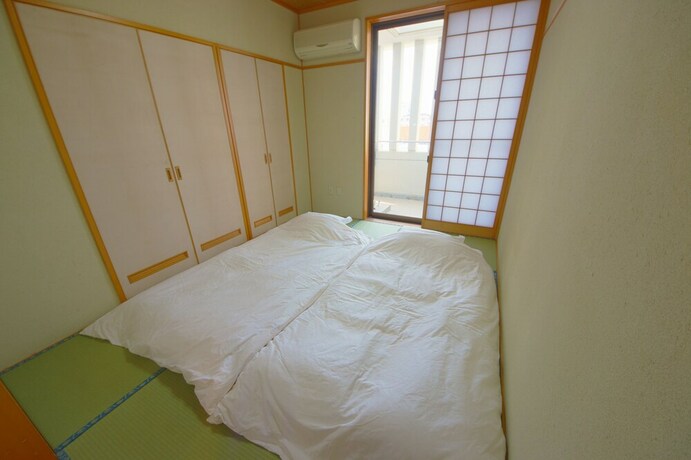 Imagen de la habitación del Hotel Sakuraya Convention City. Foto 20
