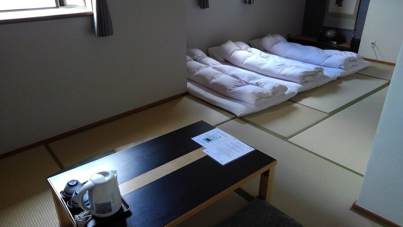 Imagen de la habitación del Hotel Sakuraya. Foto 27