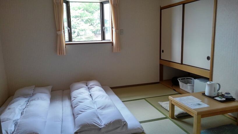 Imagen de la habitación del Hotel Sakuraya. Foto 31