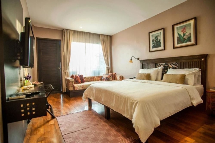 Imagen de la habitación del Hotel Sala Arun. Foto 4
