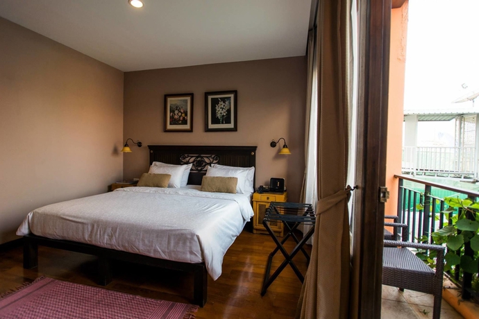 Imagen de la habitación del Hotel Sala Arun. Foto 12