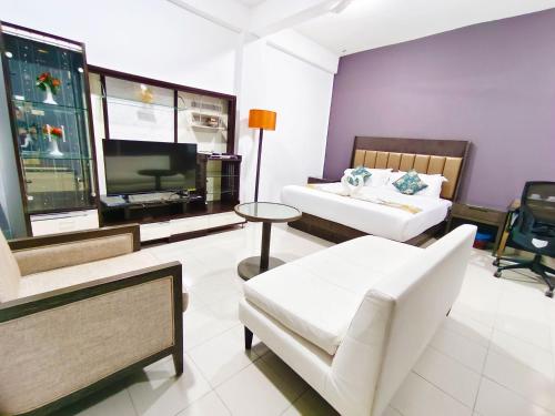 Imagen de la habitación del Hotel Salaam Suites. Foto 17