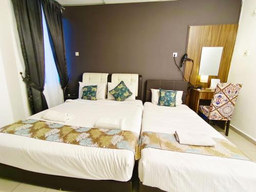 Imagen de la habitación del Hotel Salaam Suites. Foto 19