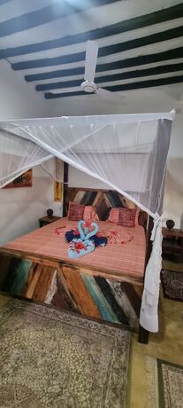 Imagen de la habitación del Hotel Salama and Mbuyuni Bungalows. Foto 11