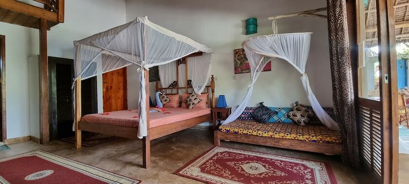 Imagen de la habitación del Hotel Salama and Mbuyuni Bungalows. Foto 12
