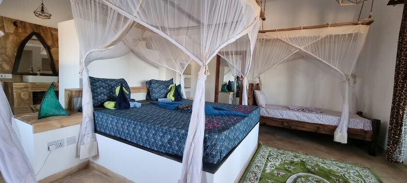 Imagen de la habitación del Hotel Salama and Mbuyuni Bungalows. Foto 17
