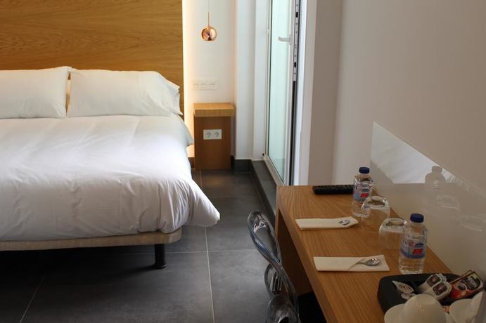 Imagen de la habitación del Hotel Salamanca Suites Libertad. Foto 7