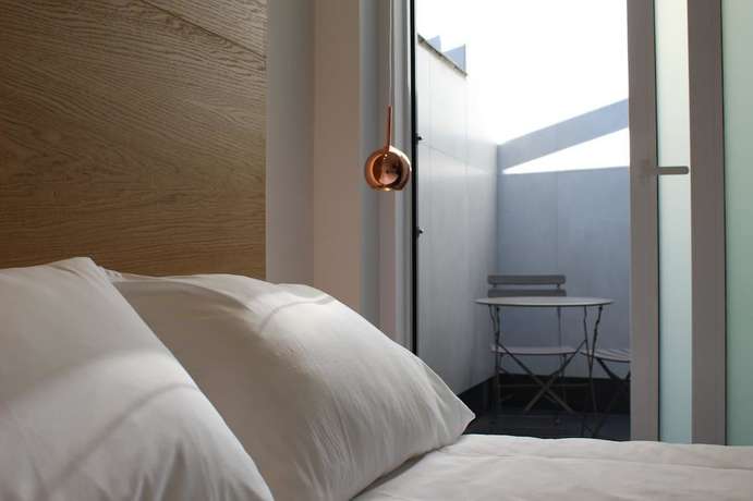 Imagen de la habitación del Hotel Salamanca Suites Libertad. Foto 13