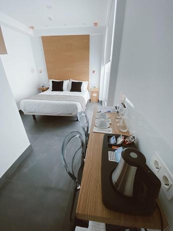 Imagen de la habitación del Hotel Salamanca Suites Libertad. Foto 17