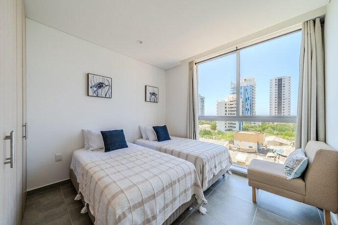 Imagen de la habitación del Hotel Salguero Suites. Foto 14
