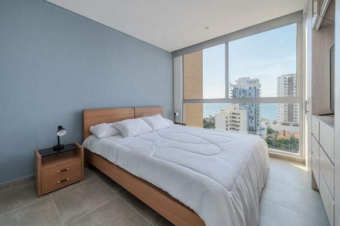 Imagen de la habitación del Hotel Salguero Suites. Foto 15