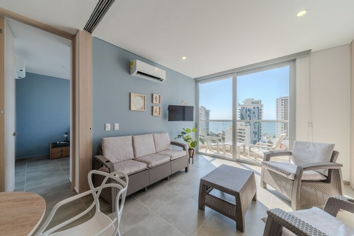 Imagen de la habitación del Hotel Salguero Suites. Foto 18